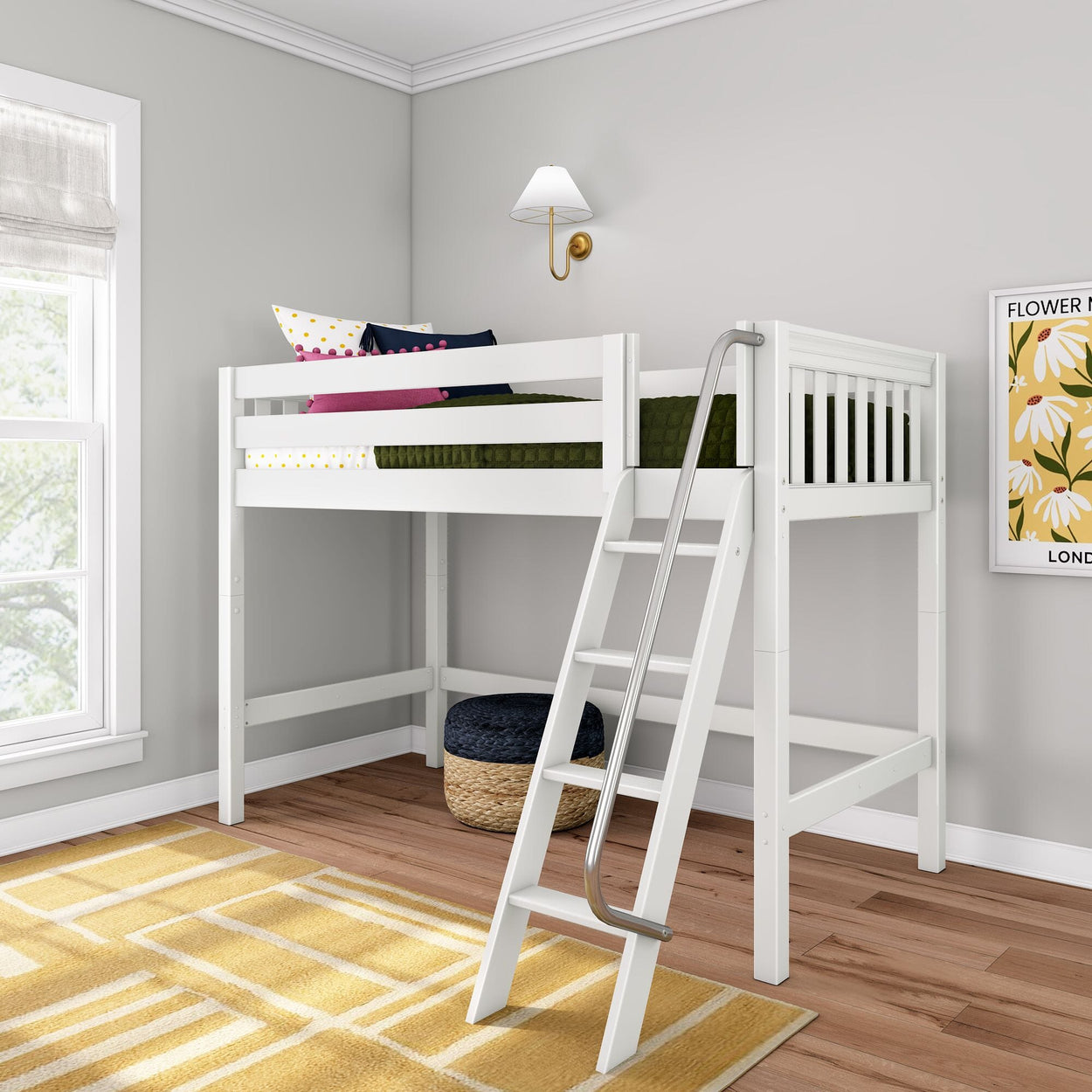 White loft bed with angled ladder and metal handrail in modern kids' room with hardwood floors, yellow geometric rug and floral wall art