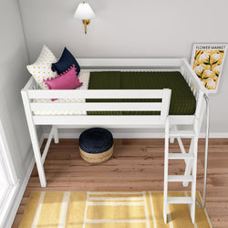 White loft bed for kids with ladder in modern children's bedroom, olive green quilt, polka dot and pink throw pillows, brass wall sconce, floral "Flower Market" art, woven pouf and yellow rug on hardwood floor
