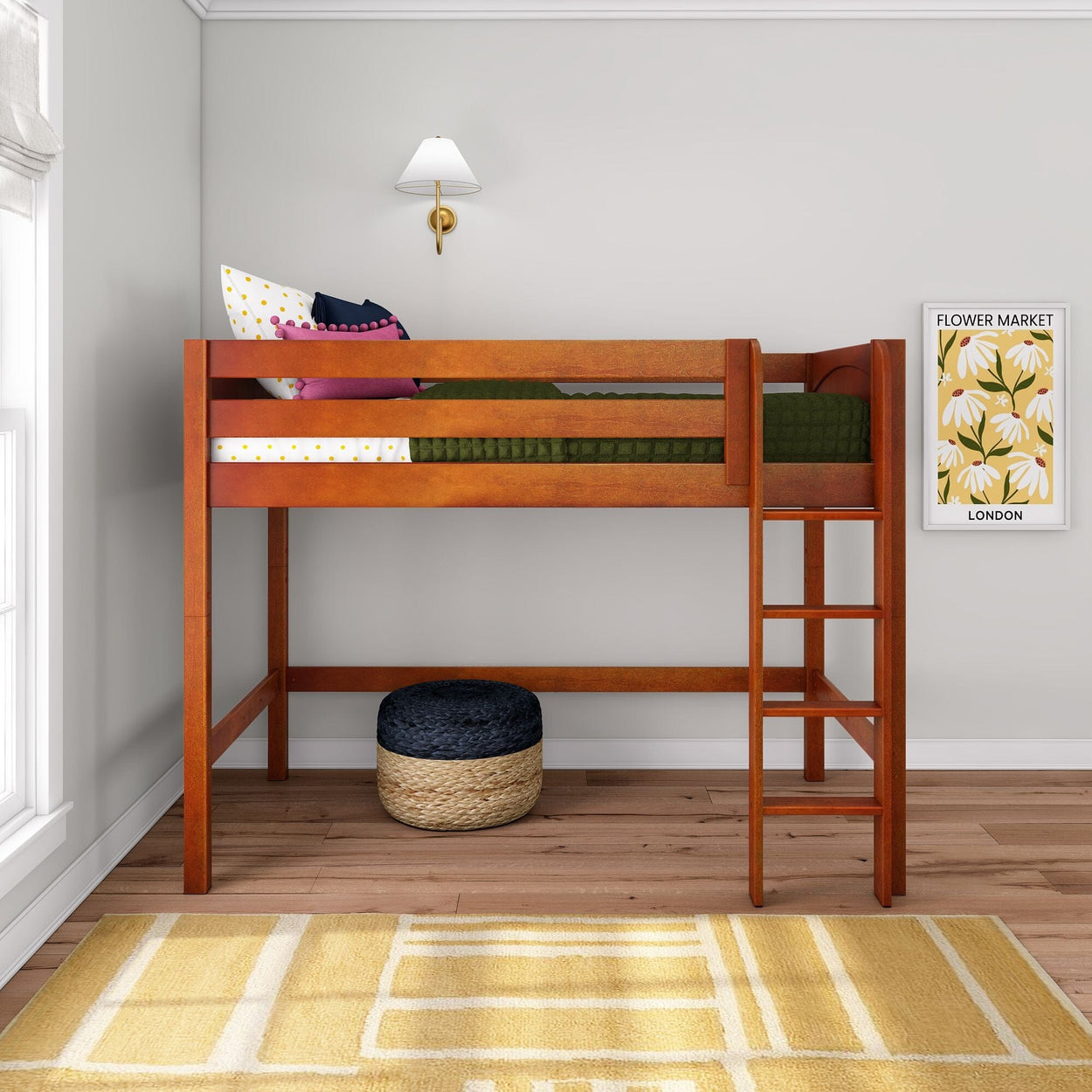 Wooden twin loft bed with ladder in modern kids bedroom, green bedding, bright pillows, woven pouf and yellow rug
