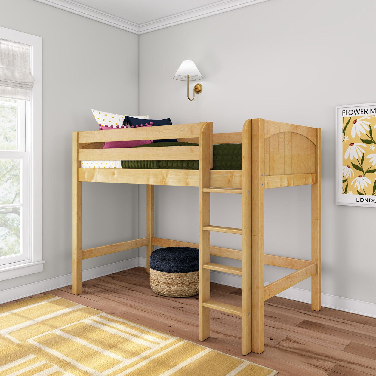 Natural wood twin loft bed with ladder in a bright kids' bedroom, space-saving elevated bed with green bedding, colorful pillows, wall sconce and floral wall art