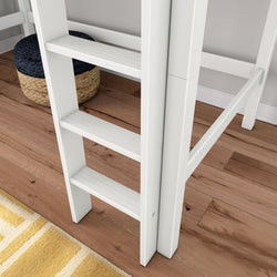Close-up of white wooden bunk bed ladder on oak hardwood floor with woven seagrass basket and yellow striped rug