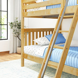 Wooden bunk bed with blue bedding and a metal ladder in a bright modern bedroom.