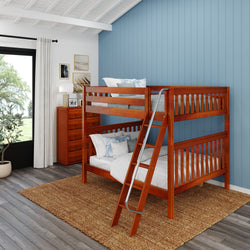 Wooden bunk bed in a stylish kids' room with blue accent wall and natural light.