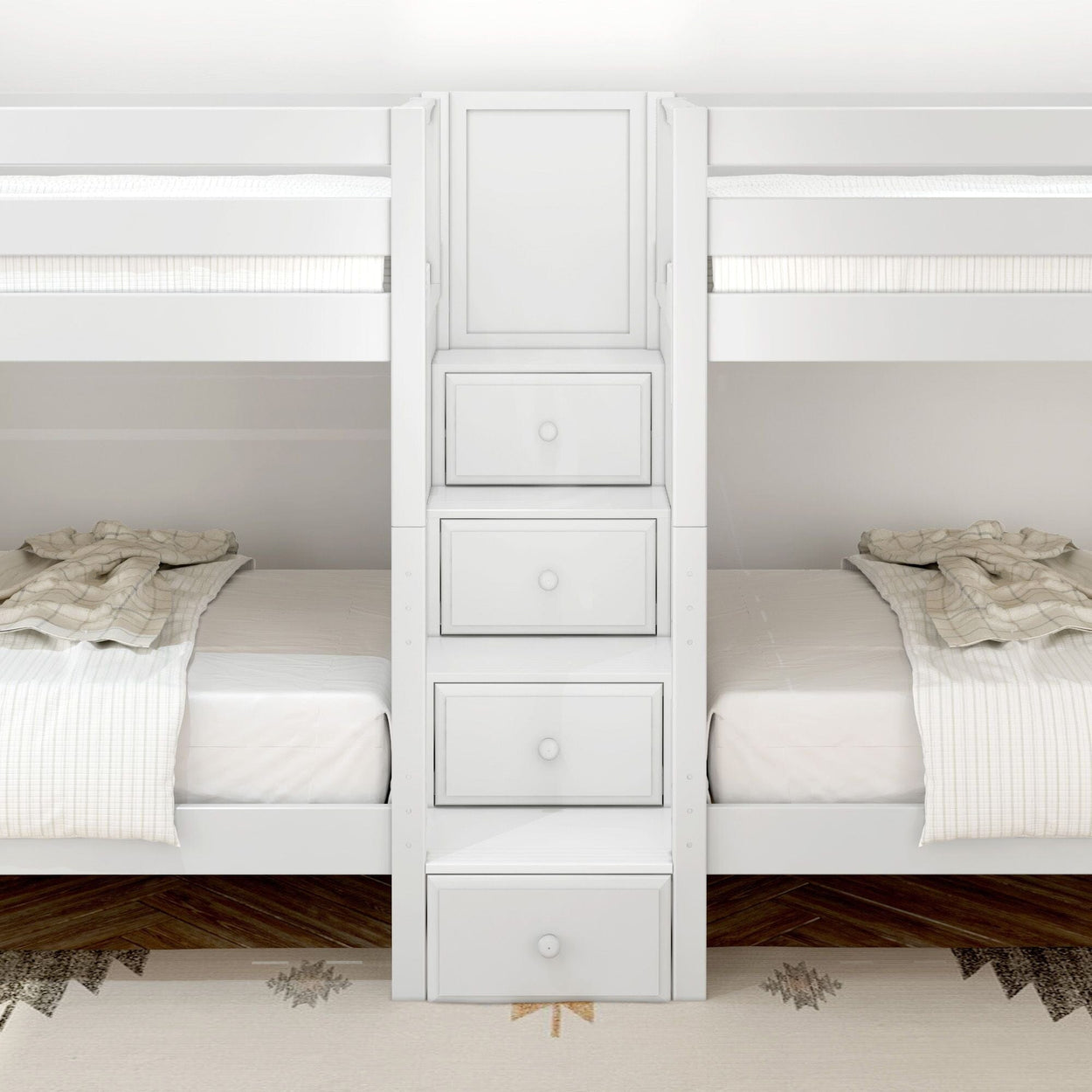 White bunk bed with storage drawers and neutral bedding in a bright bedroom.