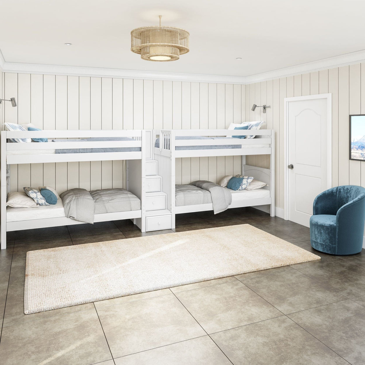 Four white bunk beds with storage stairs in a modern beige and gray bedroom featuring a cozy blue chair and minimalist decor.