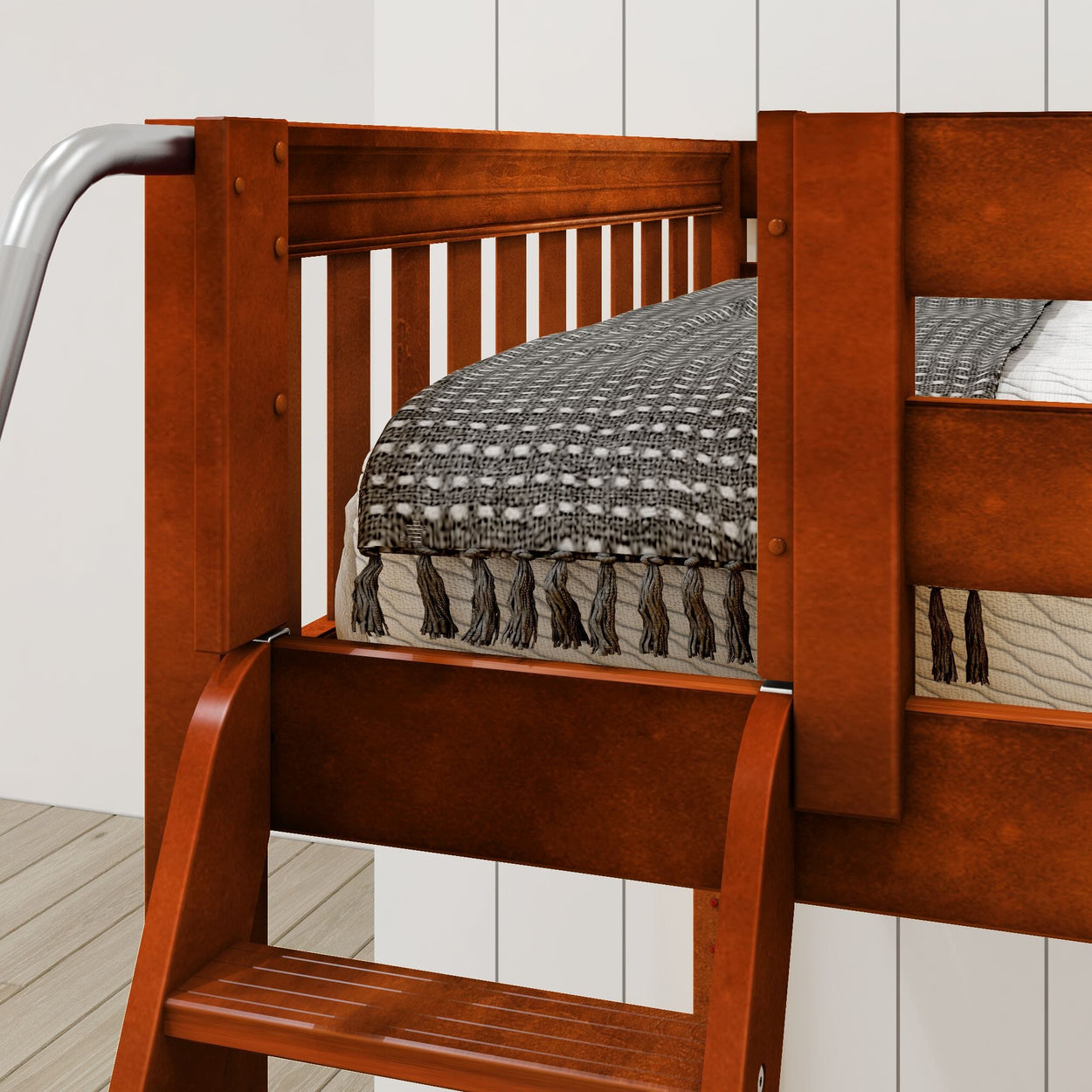 Wooden bunk bed with a cozy blanket in a modern bedroom setting.