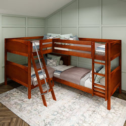 Wooden corner bunk bed with ladder in a cozy room with a pastel rug and decorative pillows.