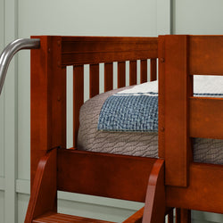 Wooden bunk bed with blue and gray bedding and attached ladder.