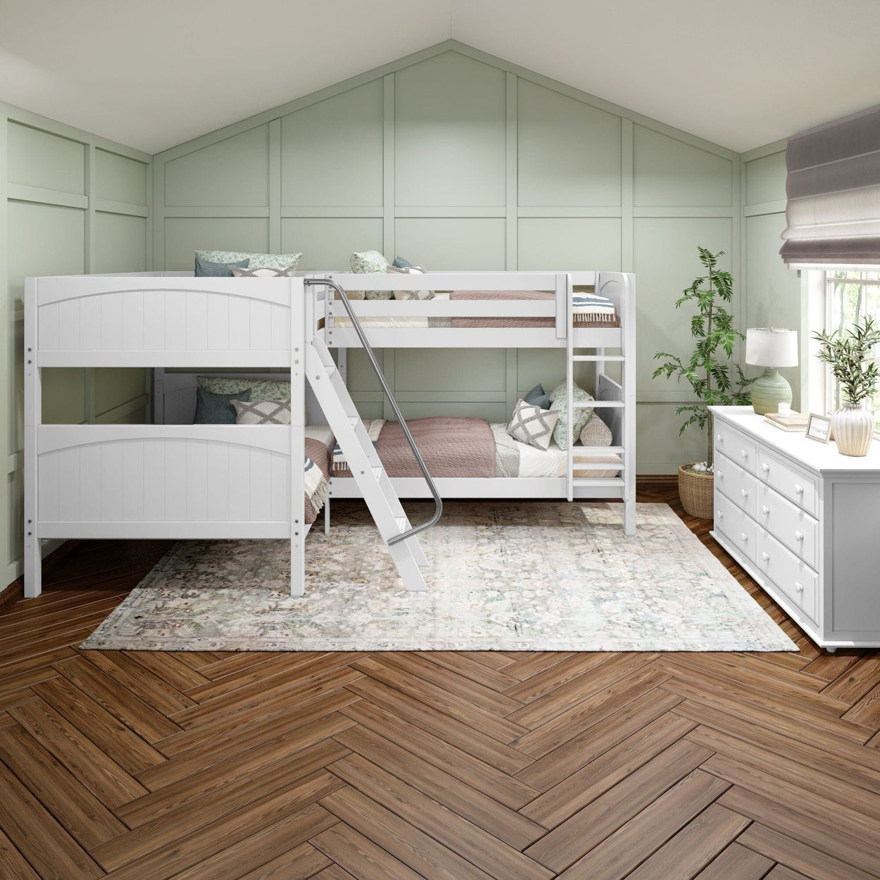 White bunk bed with ladder in modern kids' bedroom with mint green walls, floral rug, and wooden flooring.