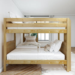 Wooden bunk bed with white bedding in a modern bedroom setting.