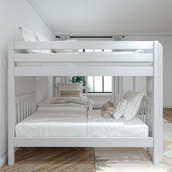 White wooden bunk bed with cozy bedding in bright, modern bedroom.