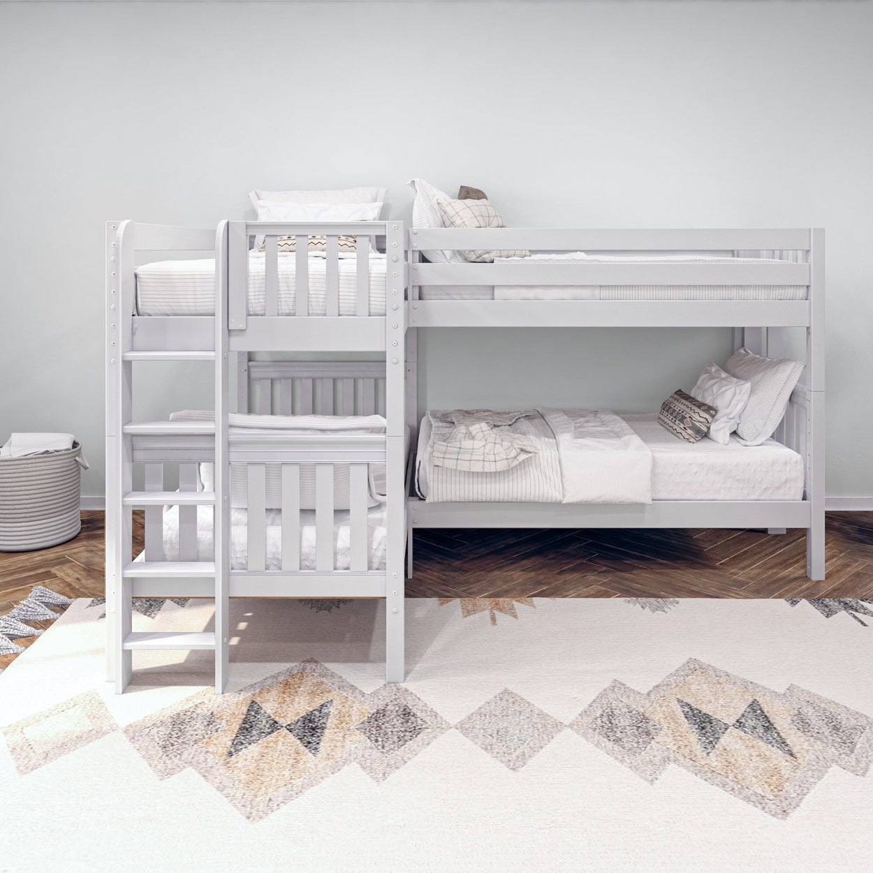 White wooden bunk bed for kids with stylish bedding in a modern bedroom setting.