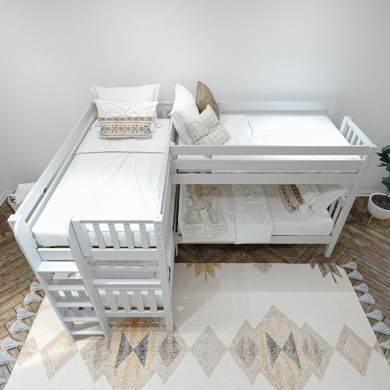 White L-shaped bunk bed with beige and patterned pillows in a modern bedroom setup.