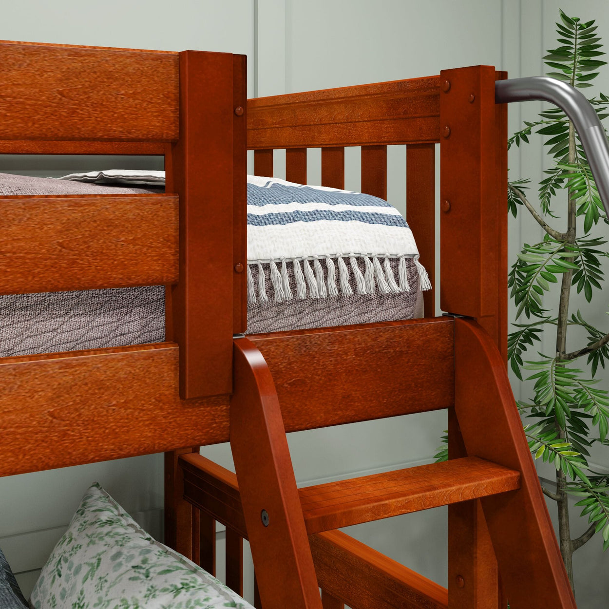 Wooden bunk bed with cozy bedding and decorative plants in a modern bedroom setting.
