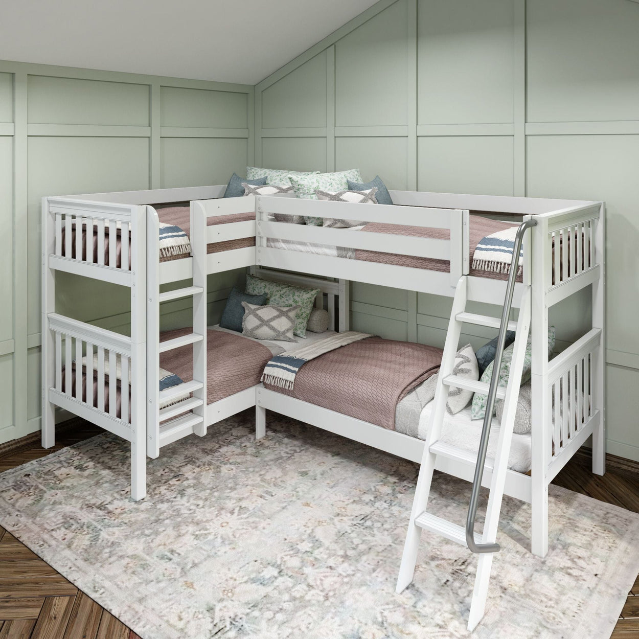 White wooden bunk bed with ladder in modern bedroom featuring pastel bedding and green paneled walls.