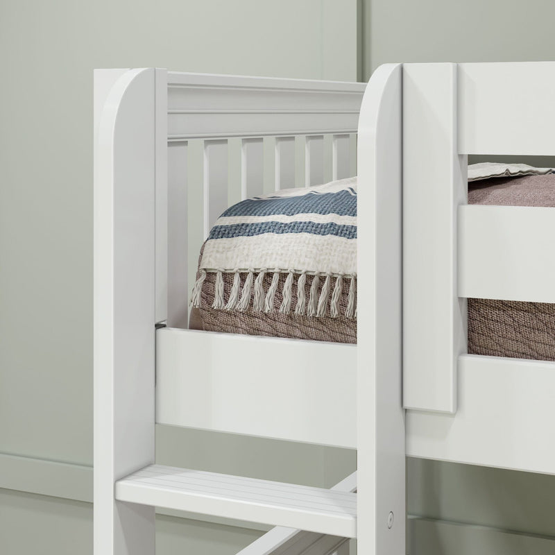 Close-up of white wooden bunk bed ladder and guardrail with blue-striped quilt and tasseled blanket, modern kids loft bed interior