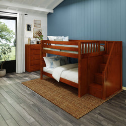 Wooden bunk bed with stairs in a cozy bedroom with blue walls, decorated with a chest of drawers and framed art.