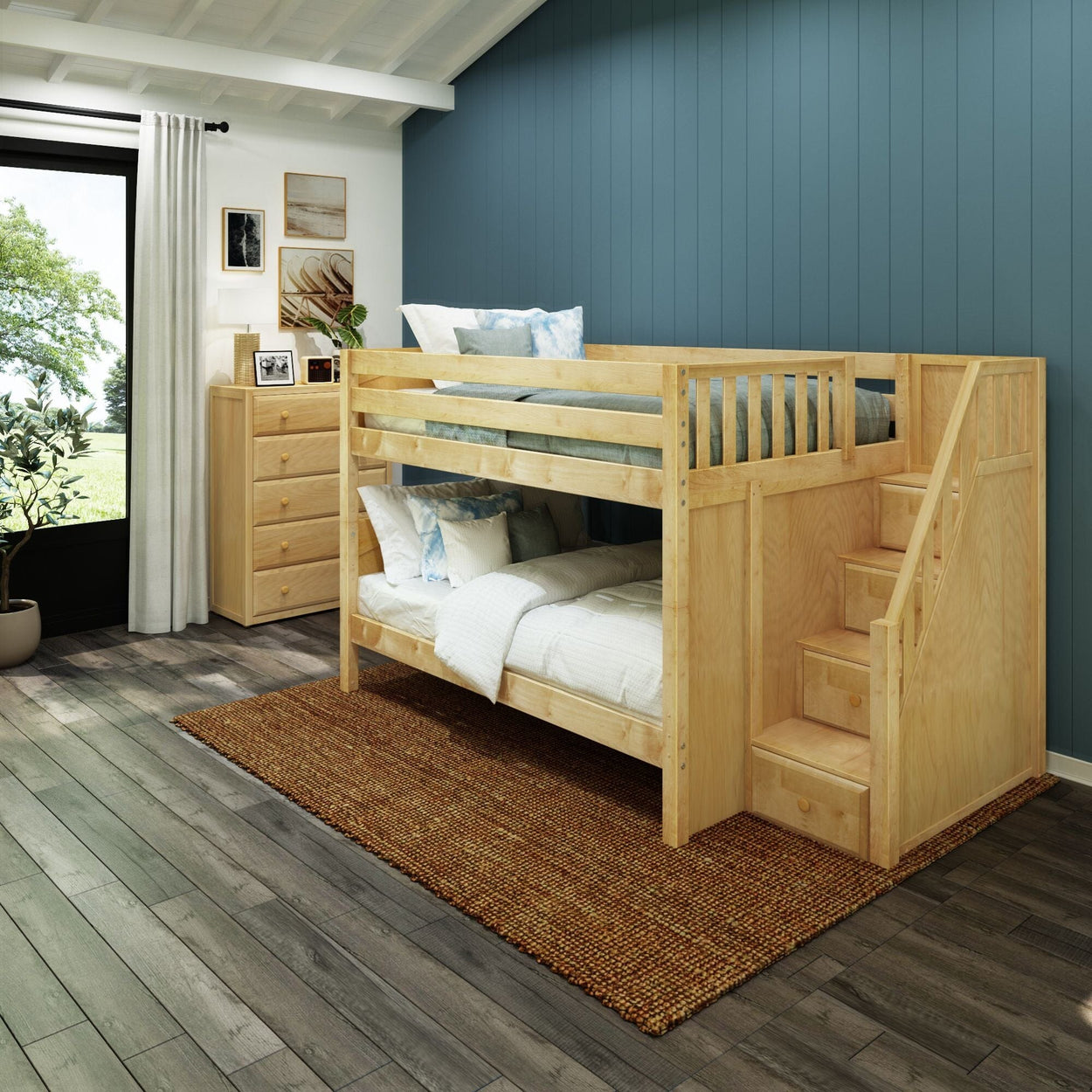 Space-saving wooden bunk bed with staircase in a modern kids' room, featuring blue accent wall and natural light.