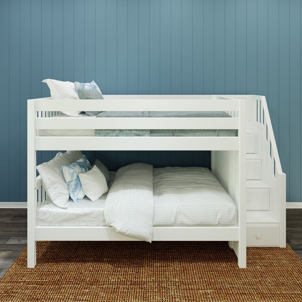 White bunk bed with stairs against a blue wall in a modern bedroom setting.