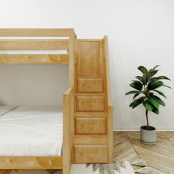 Wooden bunk bed with built-in staircase storage next to a green potted plant in a modern, minimalist bedroom.