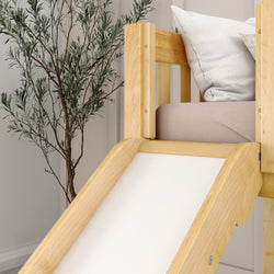 Wooden loft bed with a slide and cushions in a stylish bedroom setup.