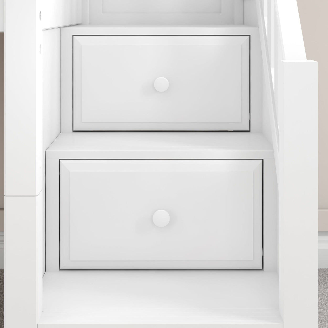 White wooden staircase with built-in storage drawers.