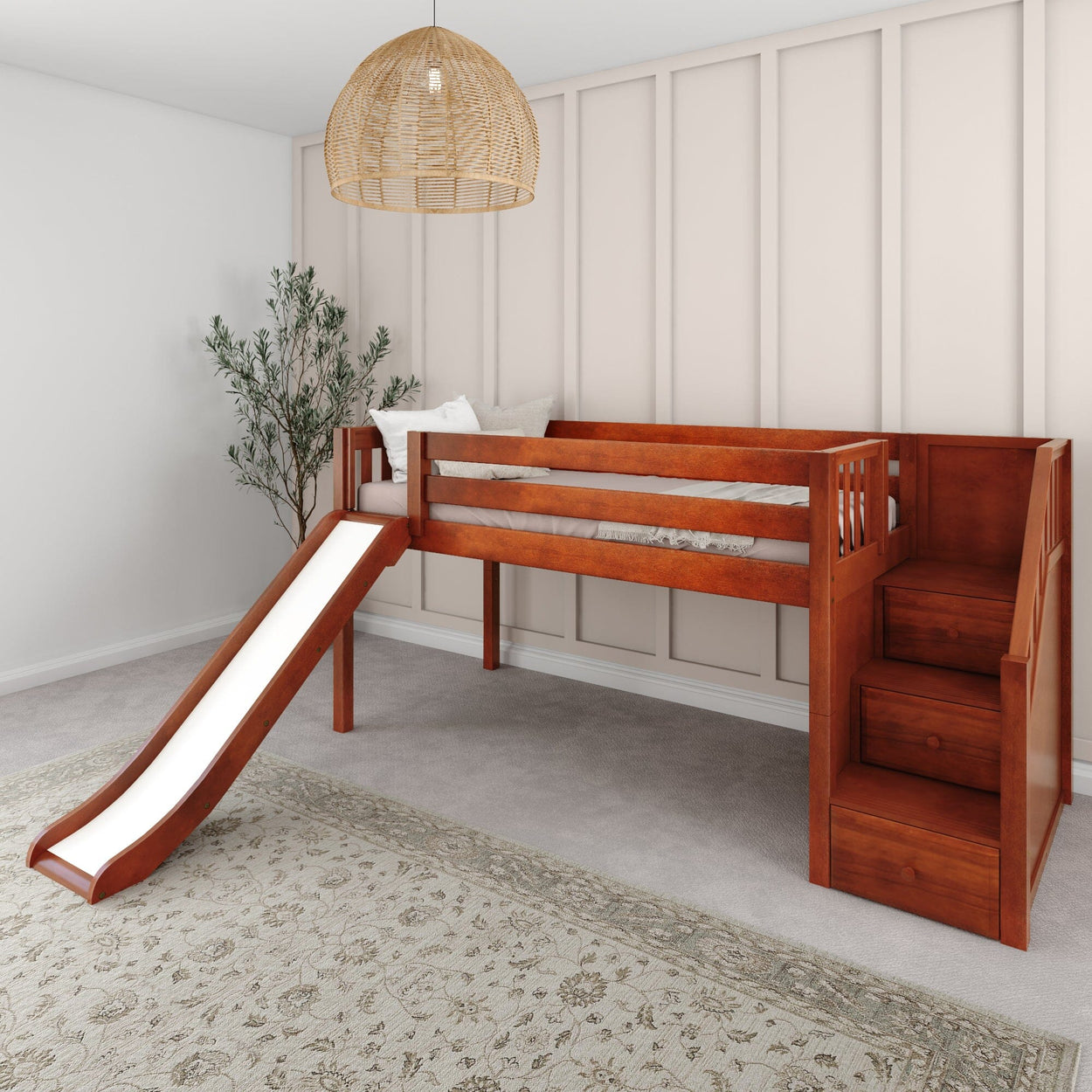 Mid-century modern kids' bed with slide and storage stairs in a stylish, light-filled room.
