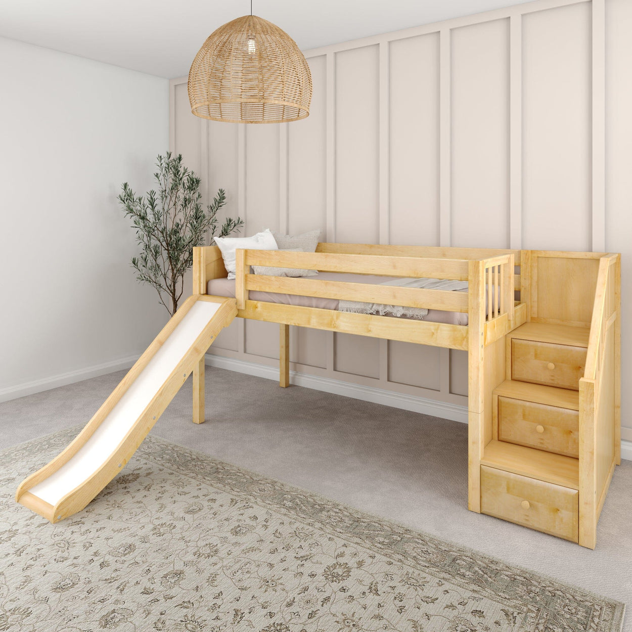 Wooden loft bed with slide and stairs in a modern children's bedroom with decorative rug and pendant light.