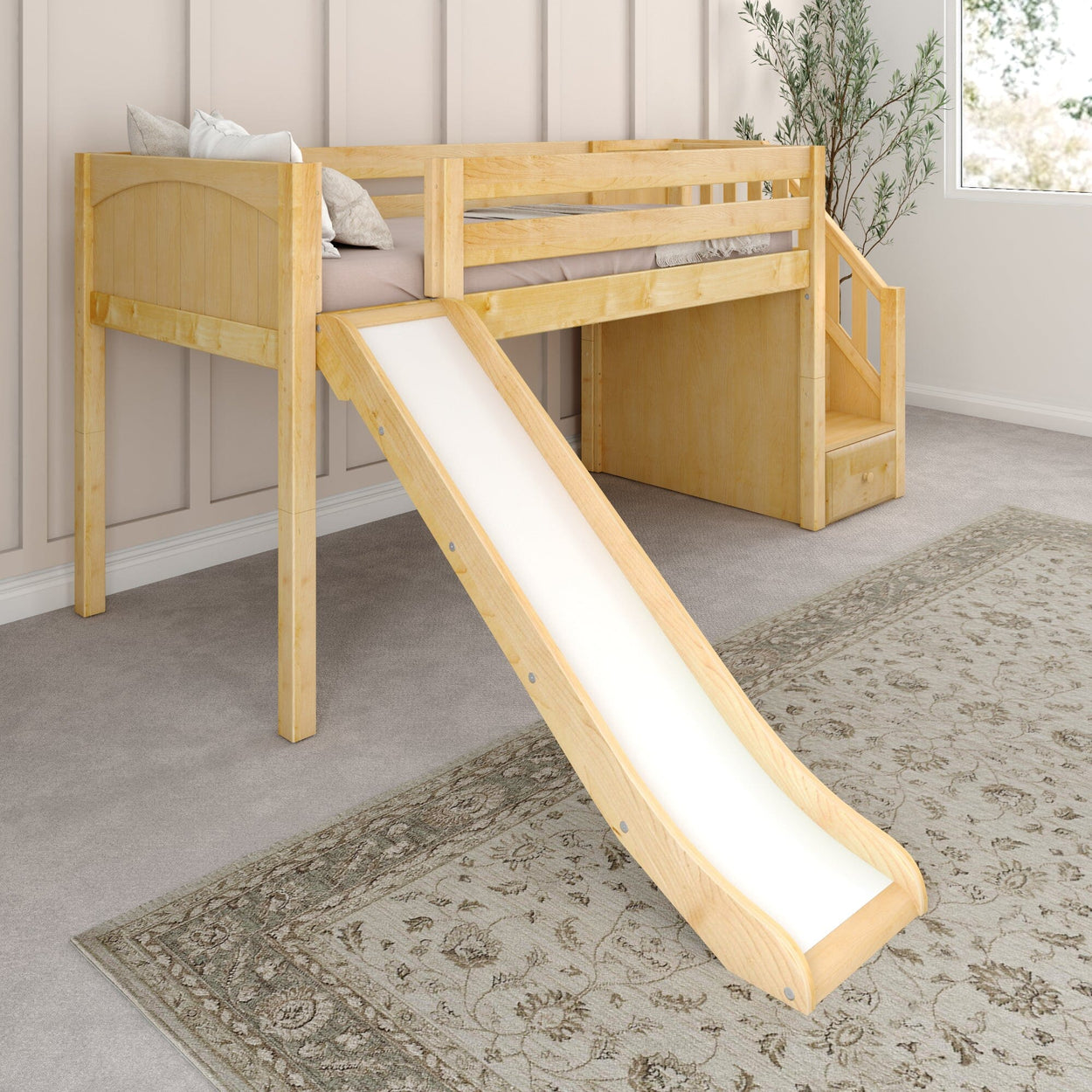 Children's wooden loft bed with slide and ladder in a cozy room setting.