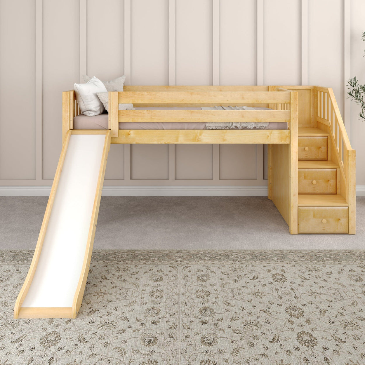 Wooden loft bed with stairs and slide in a modern kids' bedroom.