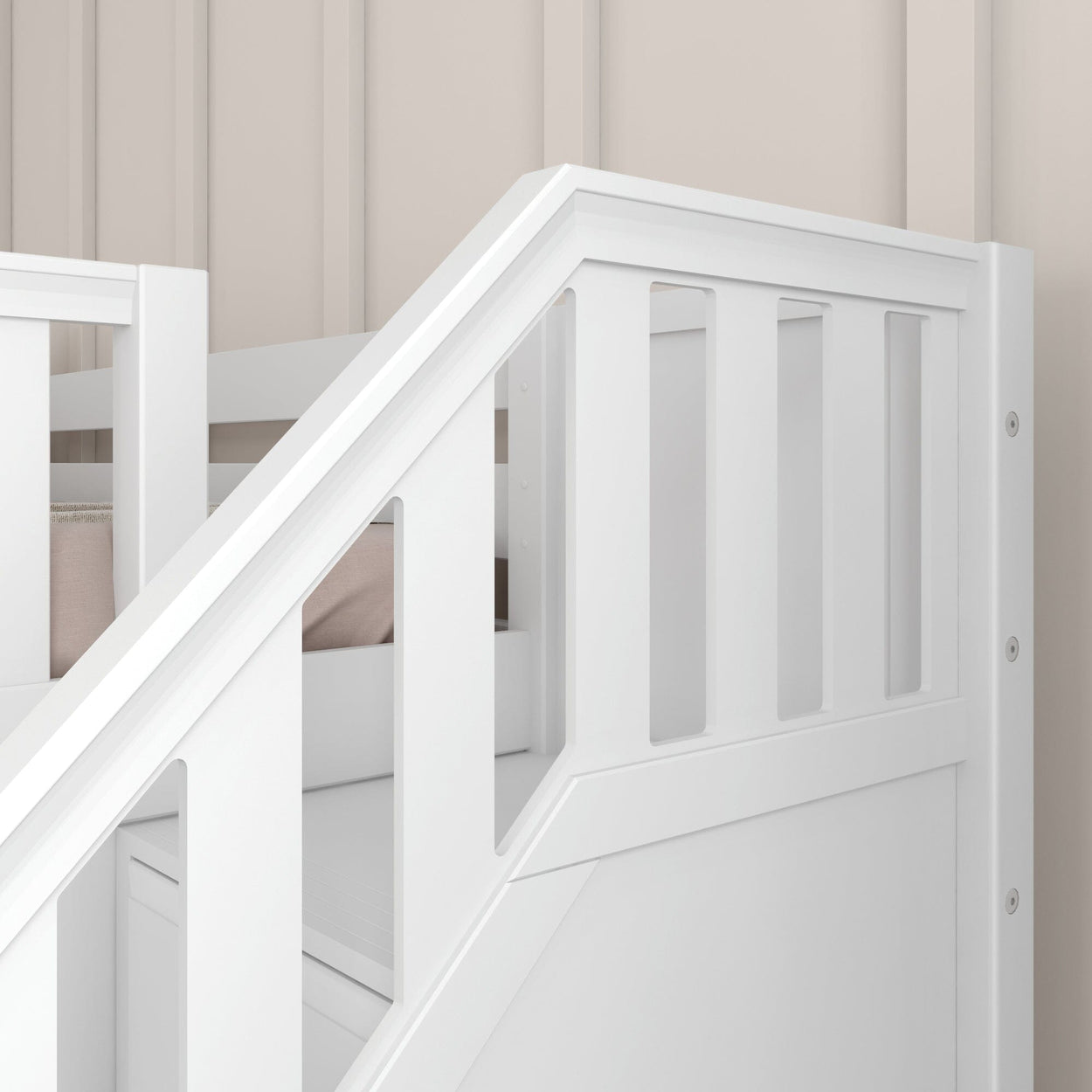 White wooden railing of a modern bed frame in a minimalistic bedroom design.