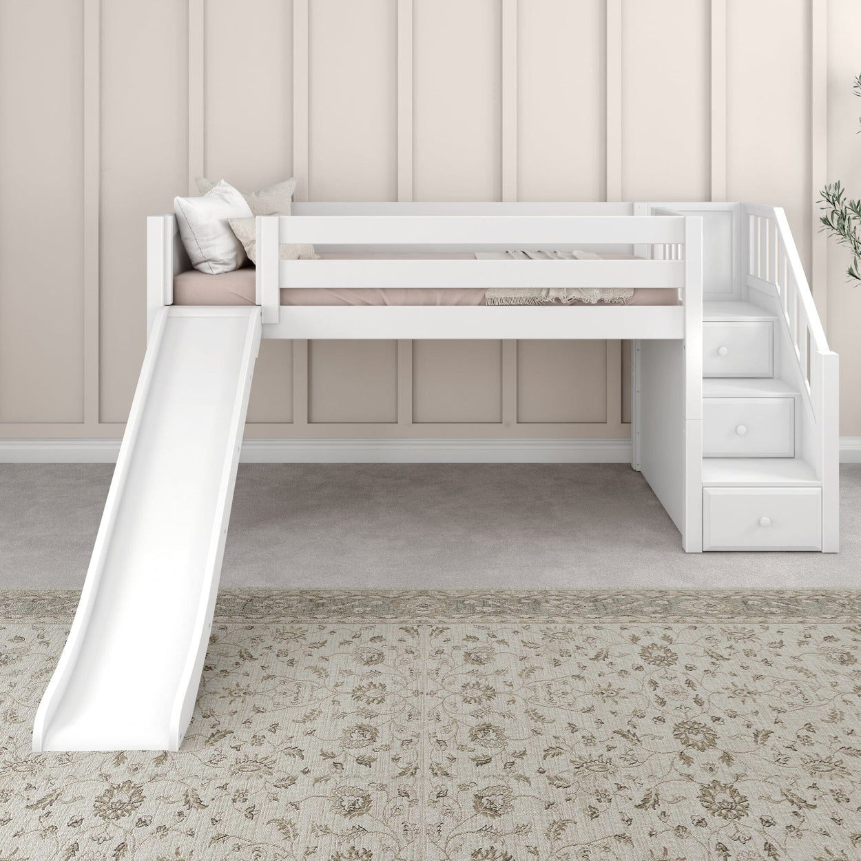 White kids' loft bed with slide and staircase in modern bedroom.