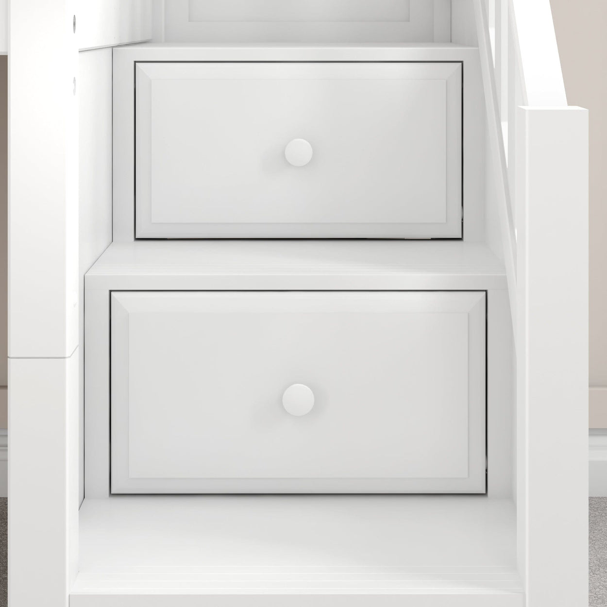 White wooden staircase with built-in storage drawers for space-saving design.