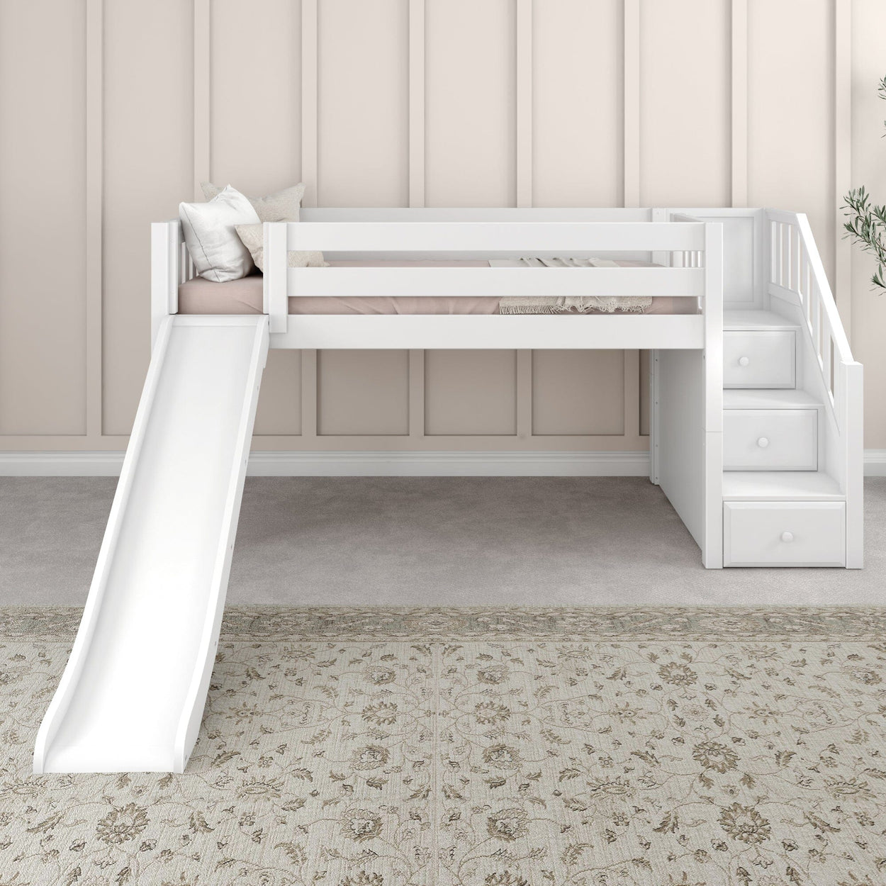 White loft bed with slide and staircase in modern children's bedroom.
