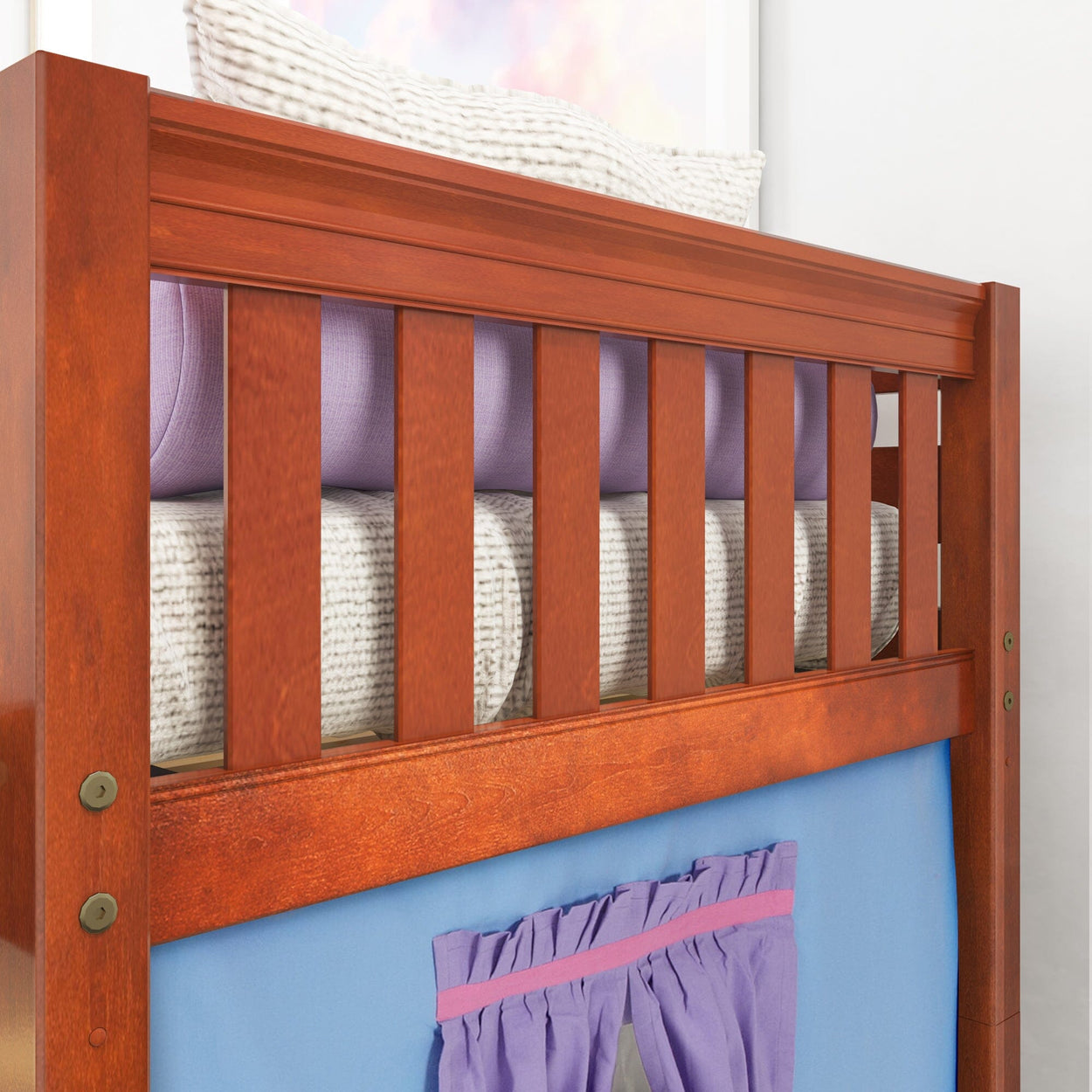 Wooden bunk bed with purple and white bedding and a blue curtain, featuring a sturdy design for kids' bedroom furniture.