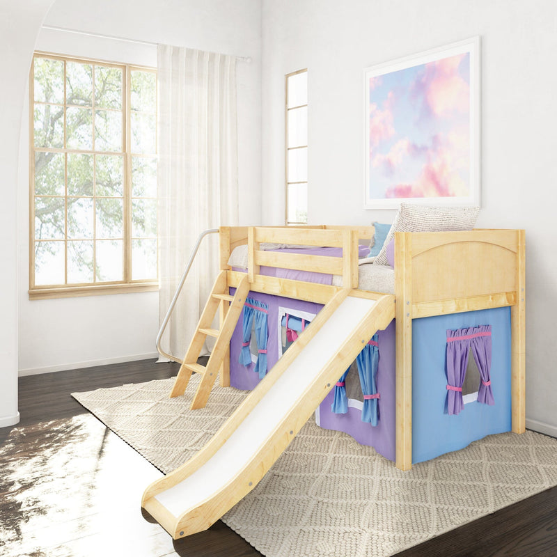 Wooden kids loft bed with slide and purple playhouse curtains in a sunlit white bedroom with large grid window and pastel cloud wall art