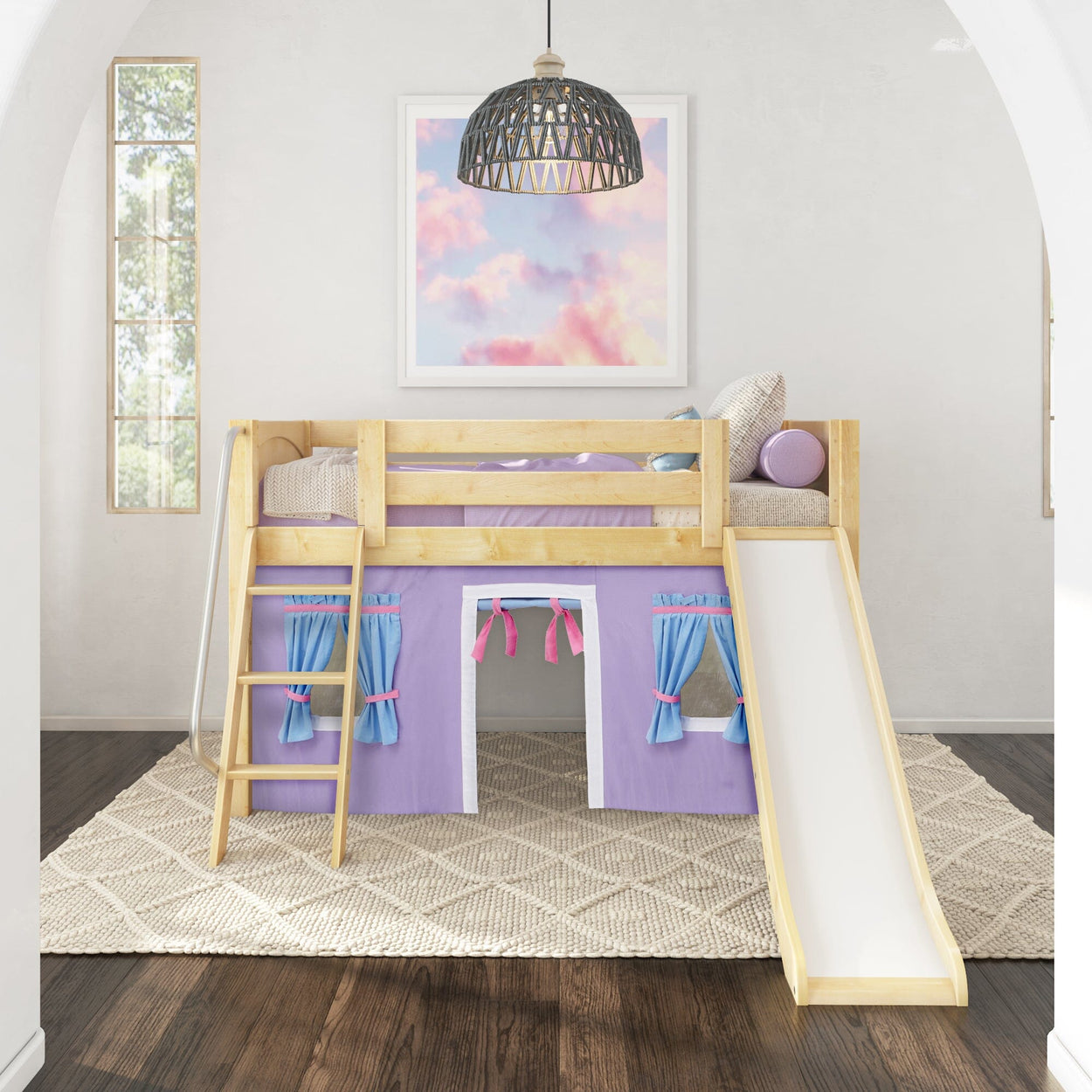 Wooden loft bed with slide and play area, featuring purple and pink curtains, in a children's bedroom with modern decor.