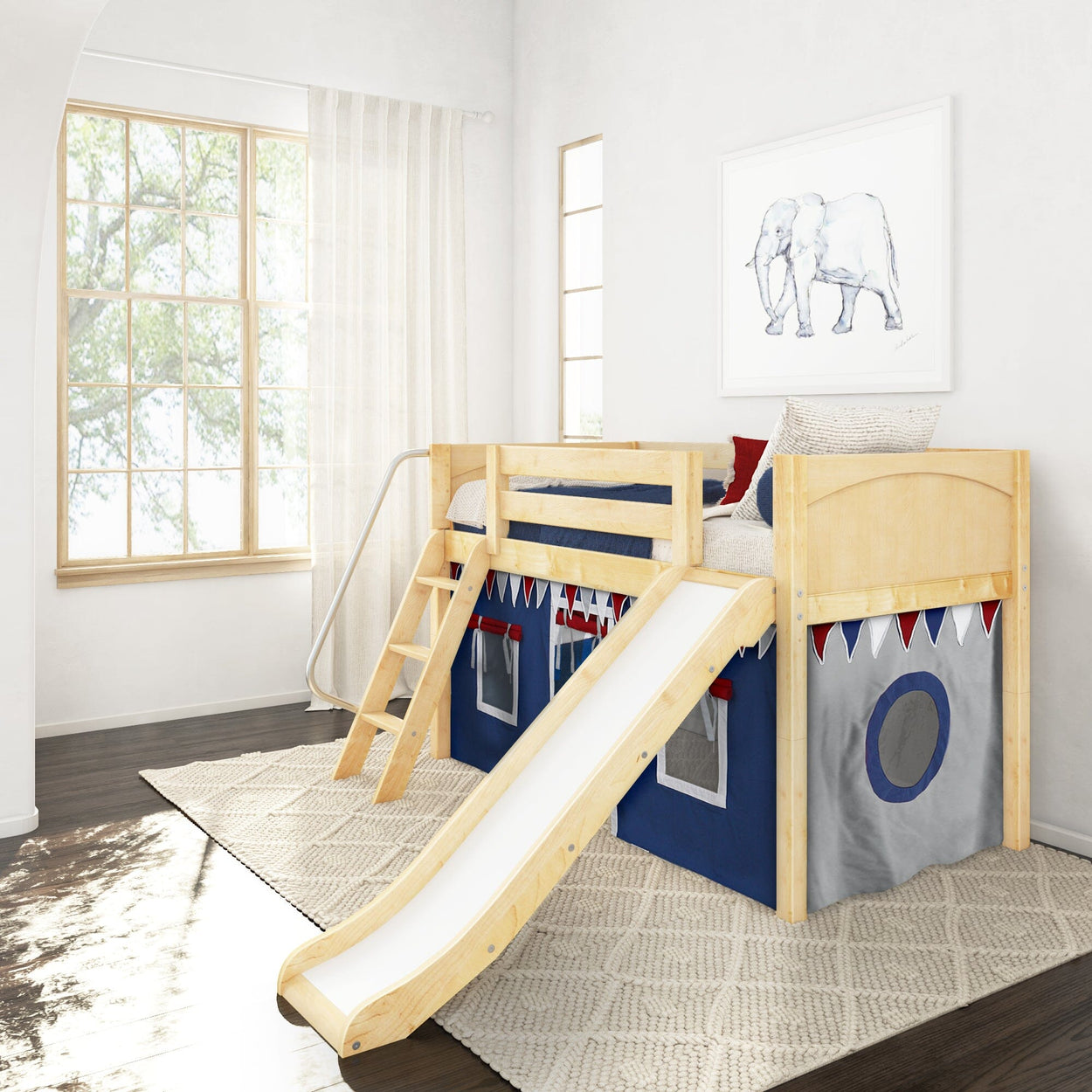 Wooden loft bed with slide and under-bed tent storage in a bright, white kids' room featuring hardwood floors and playful elephant artwork.