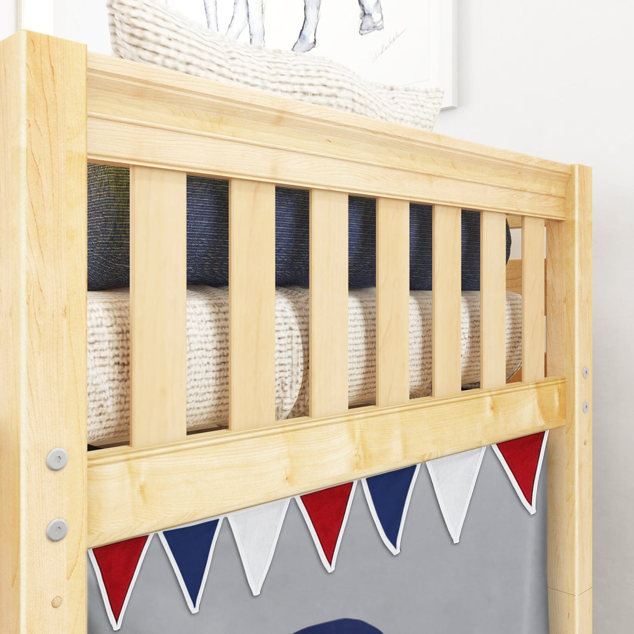 Wooden bunk bed with decorative triangular flags in red, white, and blue, showcasing cozy bedding.