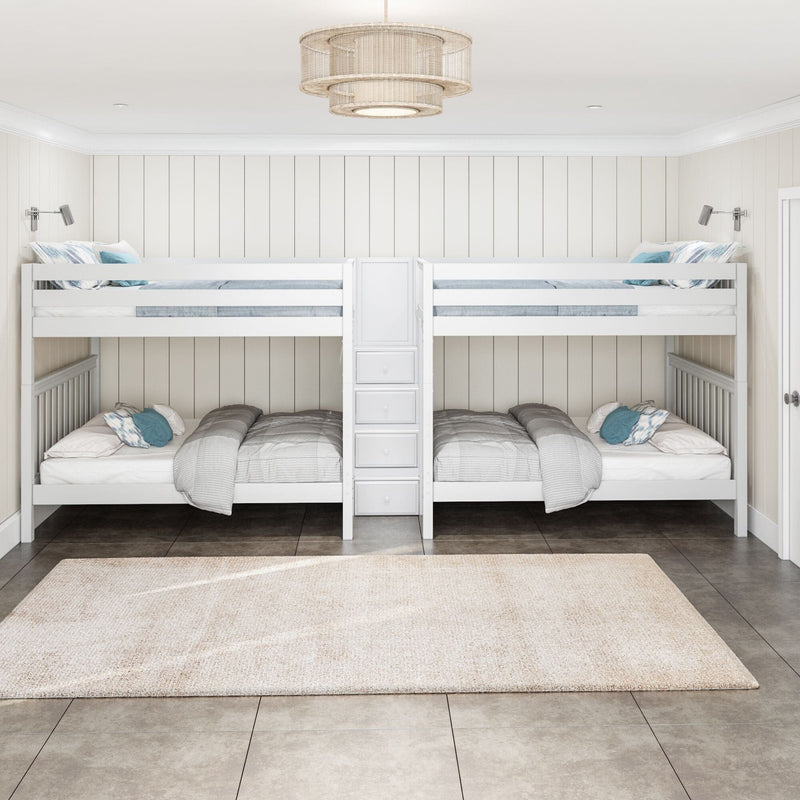 White bunk beds with built-in storage ladder in a bright coastal kids' bedroom with neutral bedding, blue accent pillows and rattan pendant light