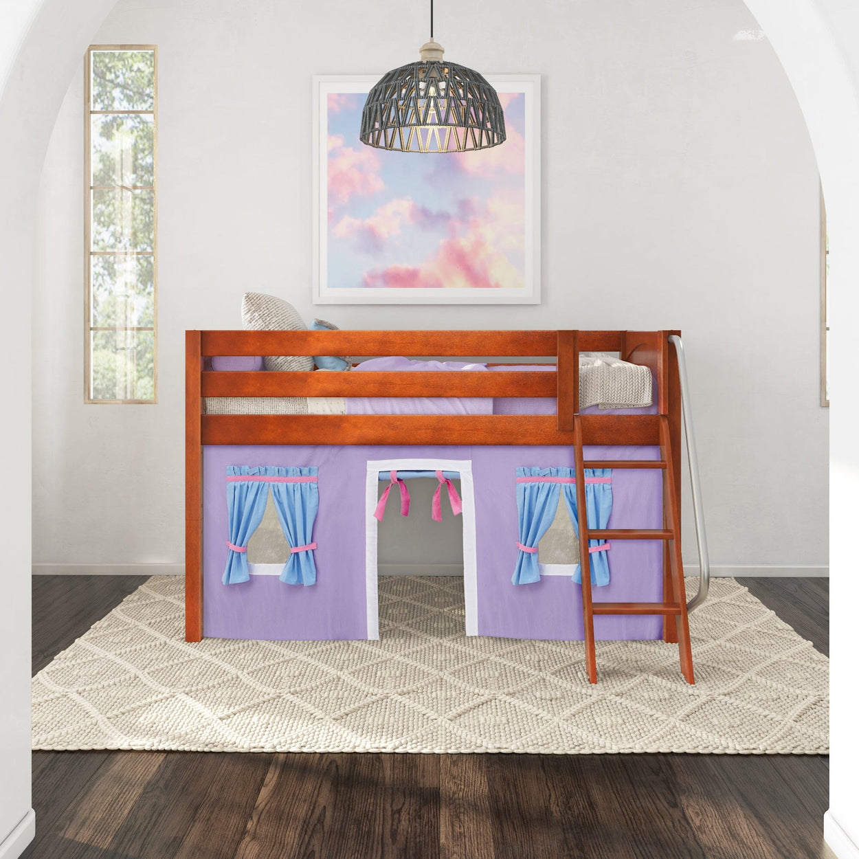 Kids loft bed with playhouse, ladder, and colorful curtains in modern bedroom.