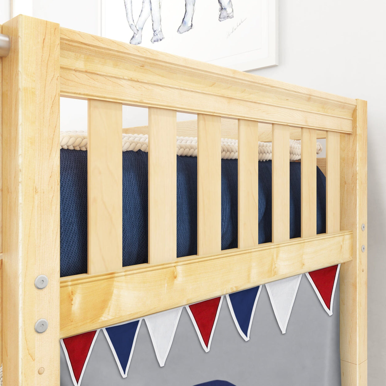 Wooden bunk bed with navy blue bedding and red, white, and blue triangle bunting accents.