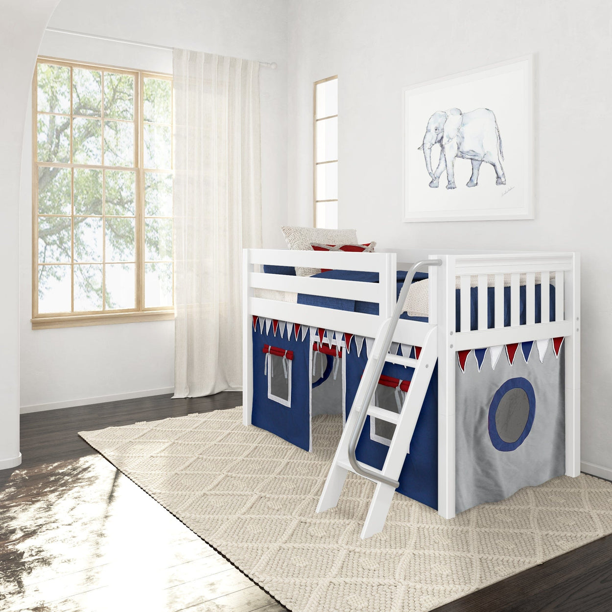 White and blue children's loft bed with ladder, themed curtains, and elephant wall art in a bright room with large window.