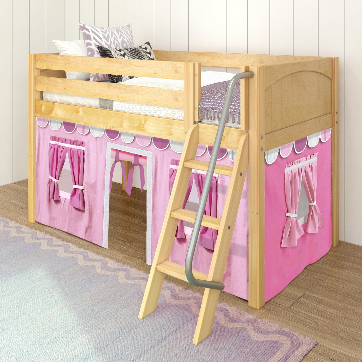 Children's wooden loft bed with pink playhouse tent and ladder in cozy bedroom setting.