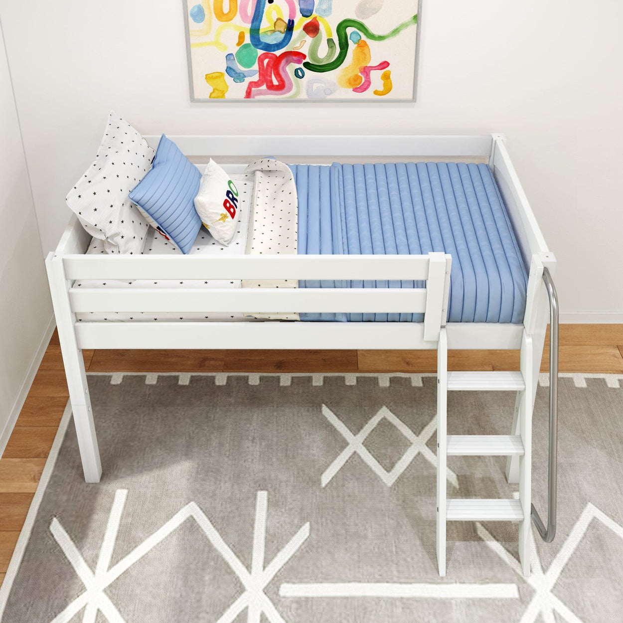Loft bed with blue bedding and decorative pillows in a modern kids' room.