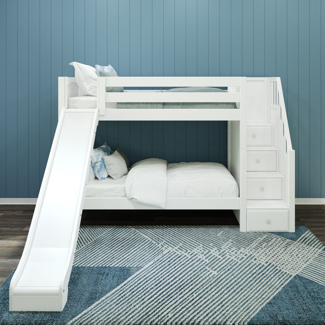 White loft bunk bed with slide and storage stairs against blue wall, featuring cozy bedding and modern rug.