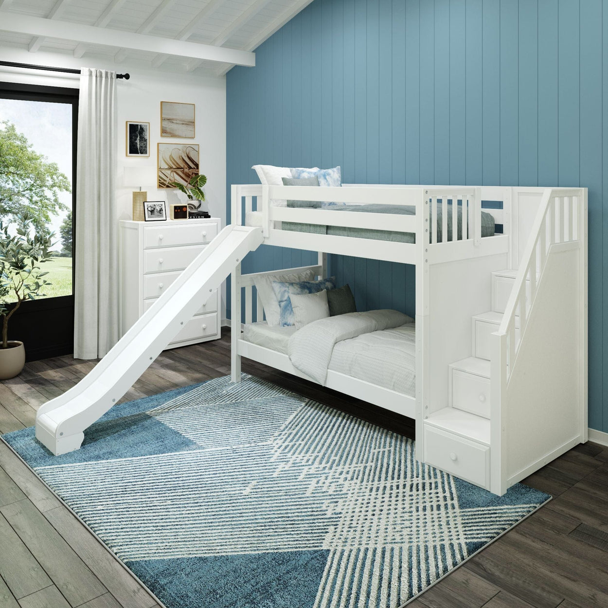 White bunk bed with slide and stairs in a modern blue-themed children's bedroom.