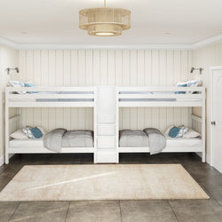 Four-bed white wooden bunk beds in a bright, cozy bedroom with beige walls and soft lighting.