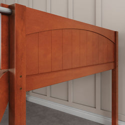 Cherry wood bed frame with panel detailing in a modern bedroom.