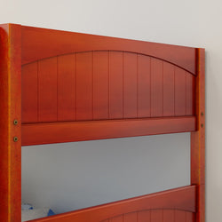 Red wooden bunk bed with arched headboard against a white wall.